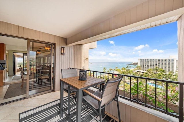 balcony featuring a water view