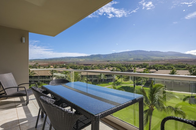 balcony featuring a mountain view