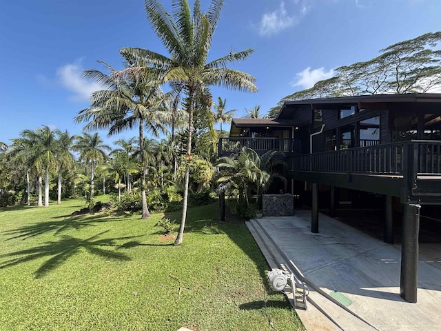 view of yard with a sunroom