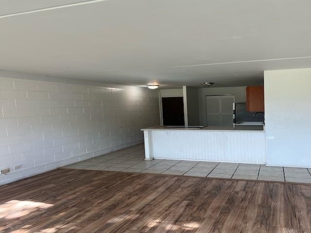 interior space featuring sink and light hardwood / wood-style floors