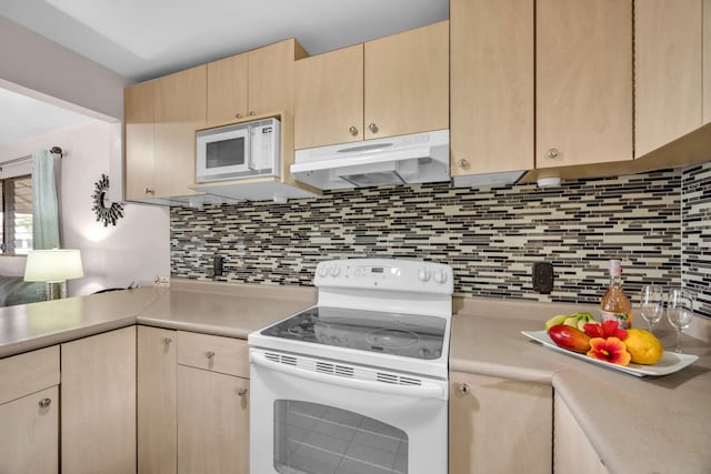 34 Wailana Pl Unit 201, Kihei, HI 96753 - kitchen with white appliances, under cabinet range hood, light brown cabinets, and light countertops