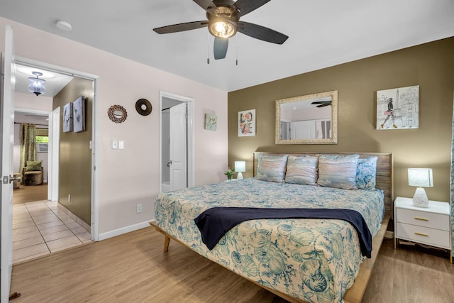 34 Wailana Pl Unit 201, Kihei, HI 96753 - bedroom with wood finished floors and a ceiling fan