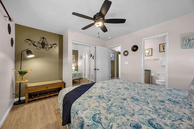34 Wailana Pl Unit 201, Kihei, HI 96753 - bedroom featuring wood finished floors, a closet, ensuite bathroom, and a ceiling fan