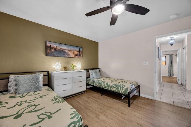 34 Wailana Pl Unit 201, Kihei, HI 96753 - bedroom featuring light wood-type flooring and a ceiling fan