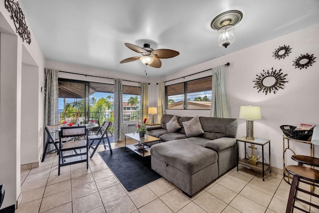 34 Wailana Pl Unit 201, Kihei, HI 96753 - living room with ceiling fan, healthy amount of natural light, and light tile patterned floors