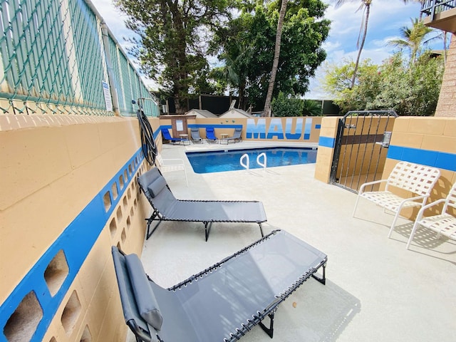 34 Wailana Pl Unit 201, Kihei, HI 96753 - view of swimming pool featuring a patio