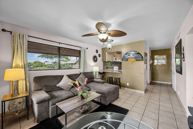 34 Wailana Pl Unit 201, Kihei, HI 96753 - living area with light tile patterned flooring and a ceiling fan