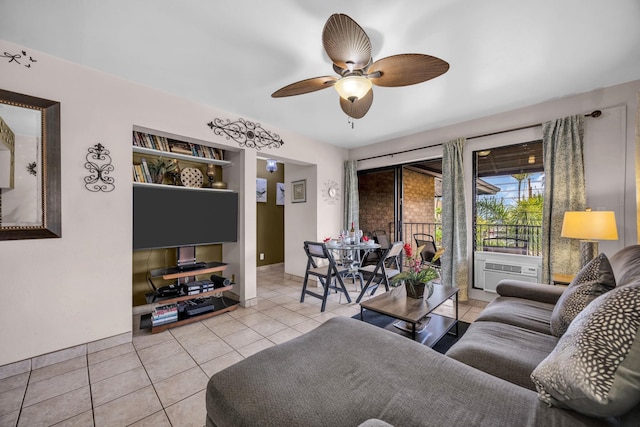 34 Wailana Pl Unit 201, Kihei, HI 96753 - living area featuring light tile patterned flooring and a ceiling fan
