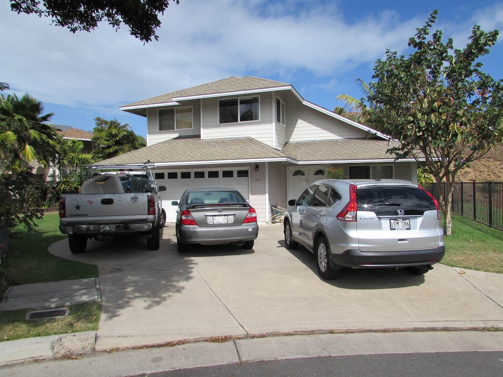 view of front of home with a garage