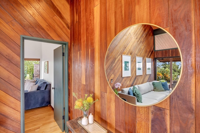 interior space featuring wooden walls