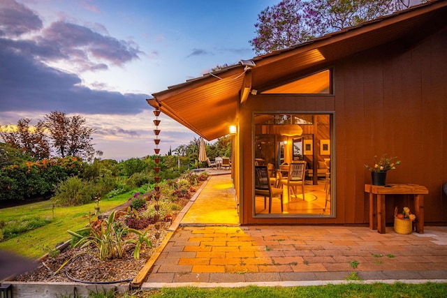 doorway to property with a patio