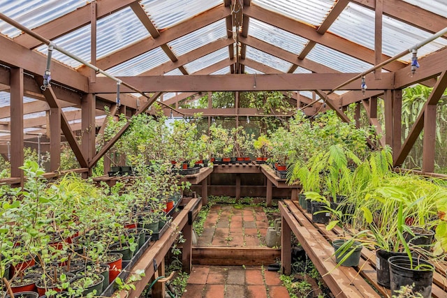 view of yard featuring a garden and a pergola