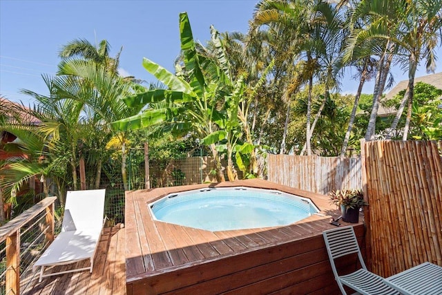 view of pool featuring a wooden deck