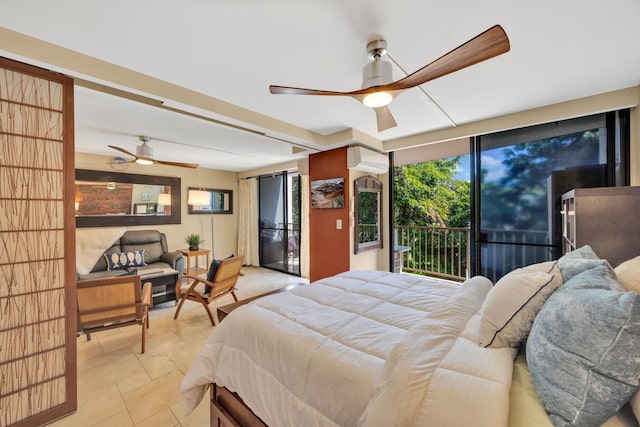 bedroom featuring expansive windows, a wall mounted air conditioner, and access to outside