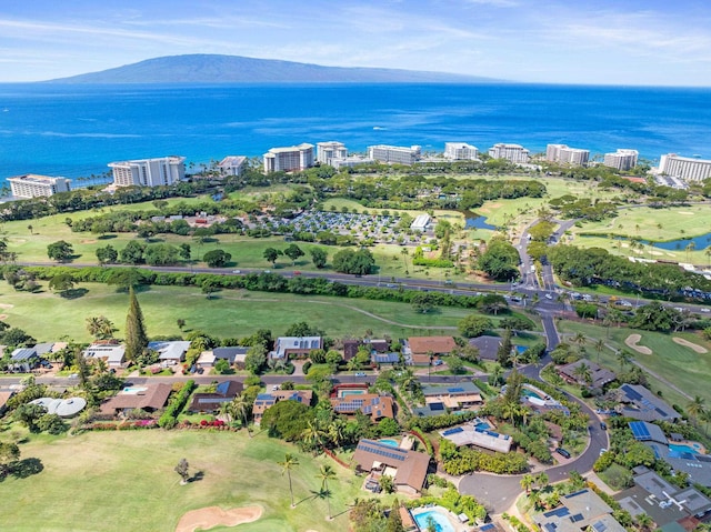 aerial view featuring a city view and a water and mountain view