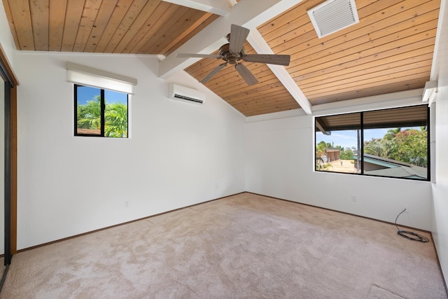 spare room with carpet flooring, a wall unit AC, vaulted ceiling with beams, and wood ceiling