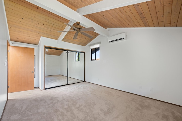 unfurnished bedroom featuring a wall mounted AC, lofted ceiling with beams, a closet, carpet, and wooden ceiling