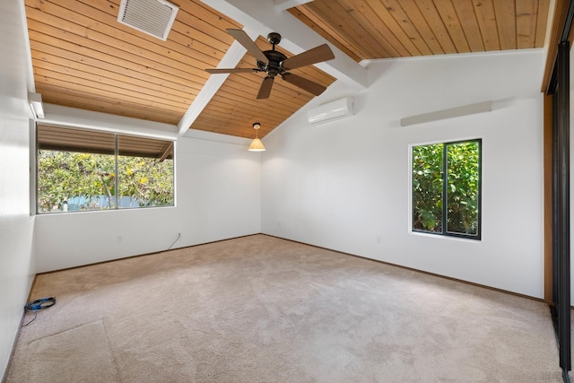 unfurnished room featuring a wealth of natural light, visible vents, and carpet flooring