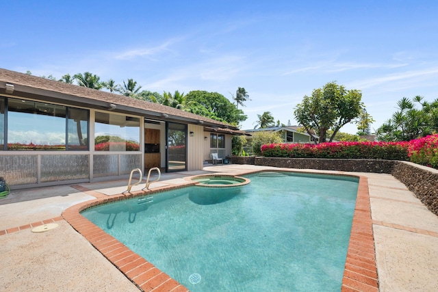 view of pool featuring an in ground hot tub and a patio