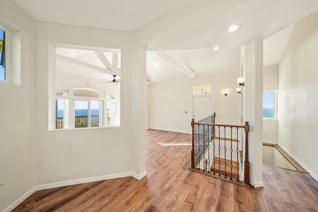 425 Kaukini Loop, Wailuku, HI 96793 - hallway featuring an upstairs landing, wood finished floors, baseboards, recessed lighting, and beamed ceiling