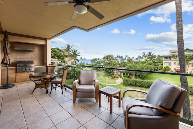 balcony featuring ceiling fan and a grill