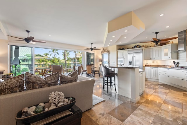 living room with ceiling fan