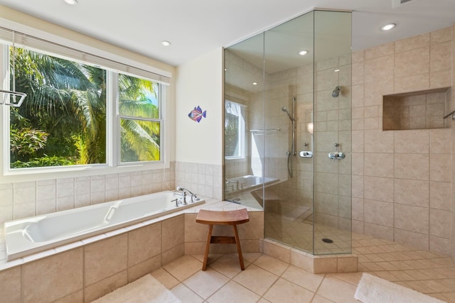 bathroom with plus walk in shower and tile patterned flooring