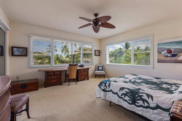 bedroom featuring ceiling fan and light colored carpet