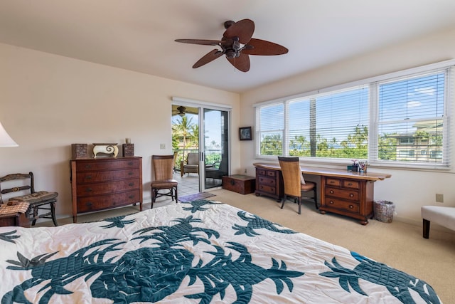 carpeted bedroom featuring ceiling fan and access to outside