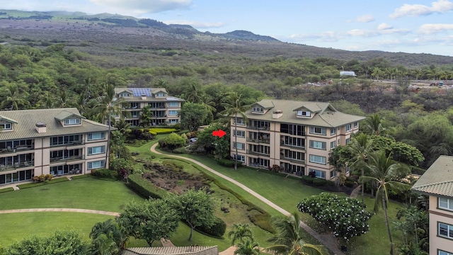 birds eye view of property featuring a mountain view