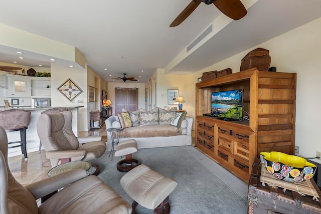 living room with ceiling fan