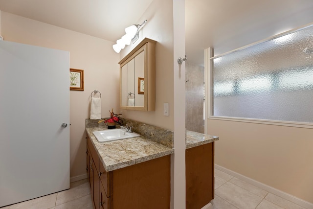 bathroom featuring vanity and tile patterned floors