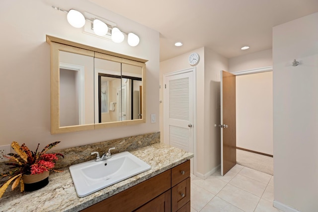 bathroom featuring vanity and tile patterned flooring