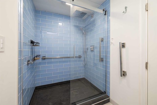 bathroom with a shower stall