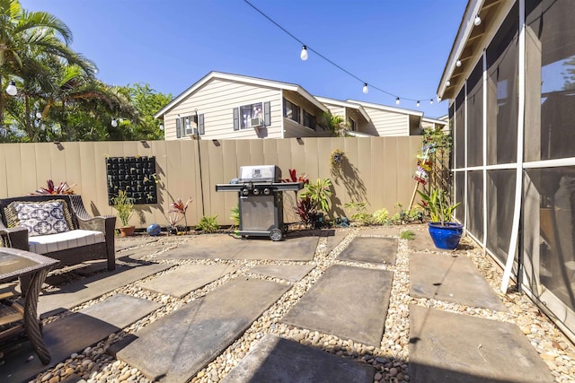 view of patio featuring grilling area and a fenced backyard