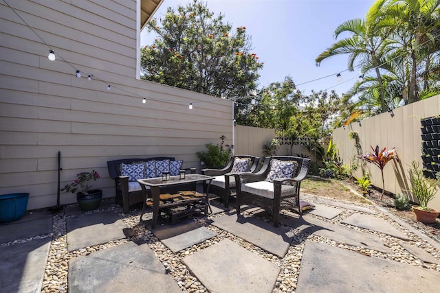 view of patio / terrace with a fenced backyard and outdoor lounge area