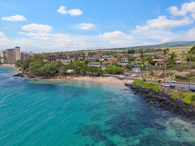 aerial view featuring a water view and a view of the beach