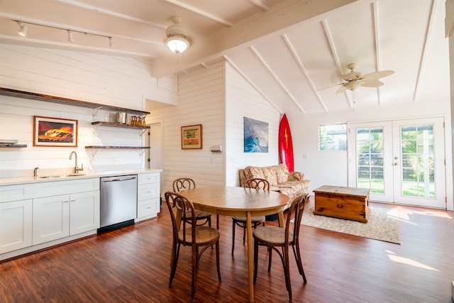 dining space featuring beam ceiling, ceiling fan, sink, french doors, and dark hardwood / wood-style flooring