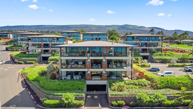 view of building exterior with a mountain view