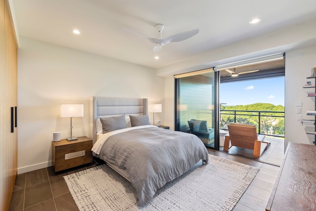 bedroom featuring dark tile patterned flooring, ceiling fan, and access to outside