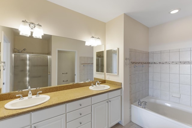 bathroom with vanity and plus walk in shower