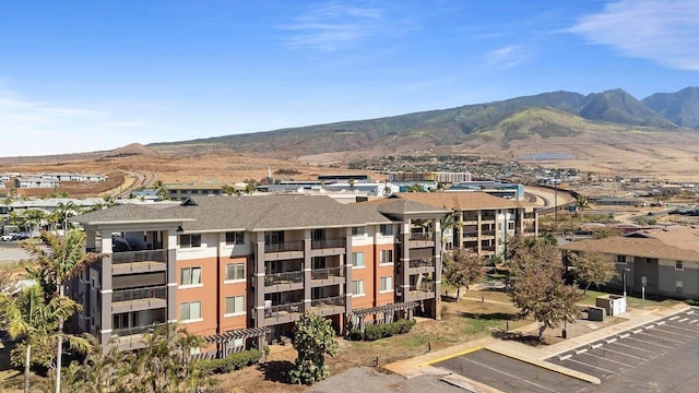 view of building exterior with a mountain view