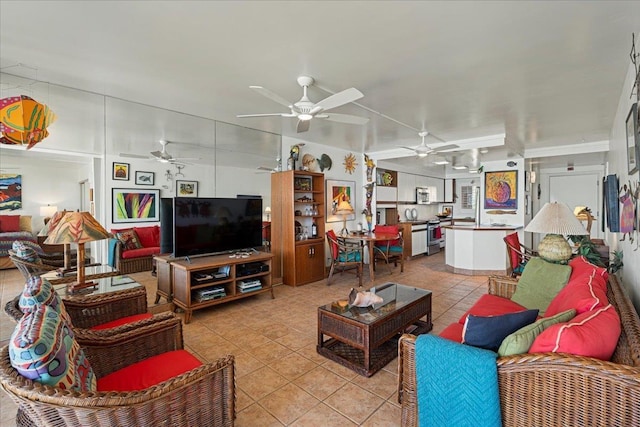 70 Hauoli St Unit 217, Wailuku, HI 96793 - living room featuring light tile patterned flooring and a ceiling fan