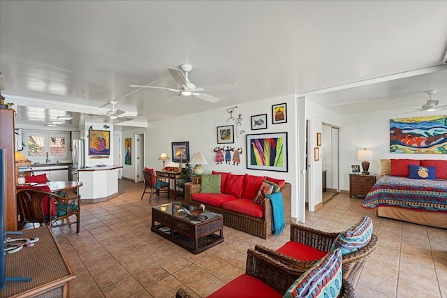 70 Hauoli St Unit 217, Wailuku, HI 96793 - living area featuring a ceiling fan and light tile patterned flooring