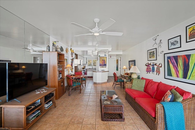 70 Hauoli St Unit 217, Wailuku, HI 96793 - living area with ceiling fan and light tile patterned floors