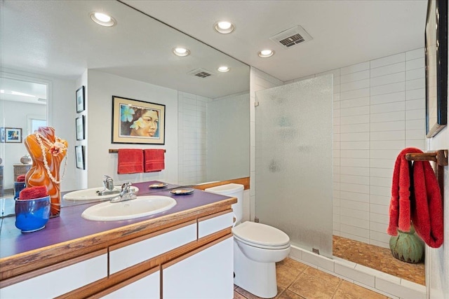 70 Hauoli St Unit 217, Wailuku, HI 96793 - full bathroom featuring walk in shower, recessed lighting, toilet, tile patterned flooring, and vanity