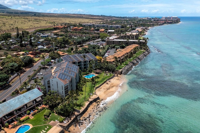 bird's eye view with a view of the beach and a water view