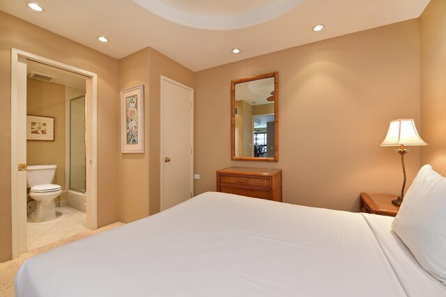 tiled bedroom with ensuite bath