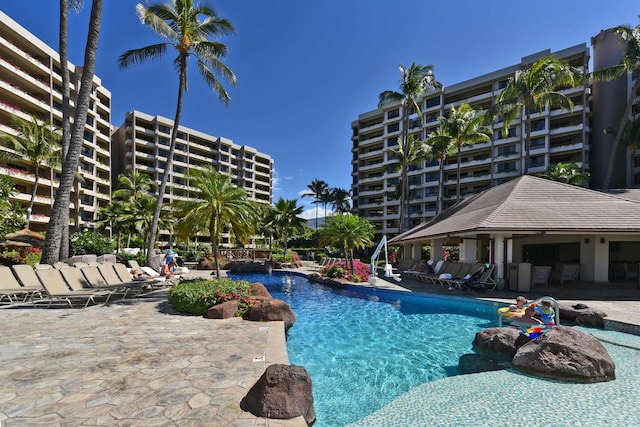 view of swimming pool with a patio area