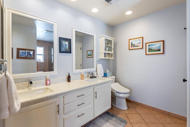 full bath featuring visible vents, a sink, toilet, and tile patterned floors